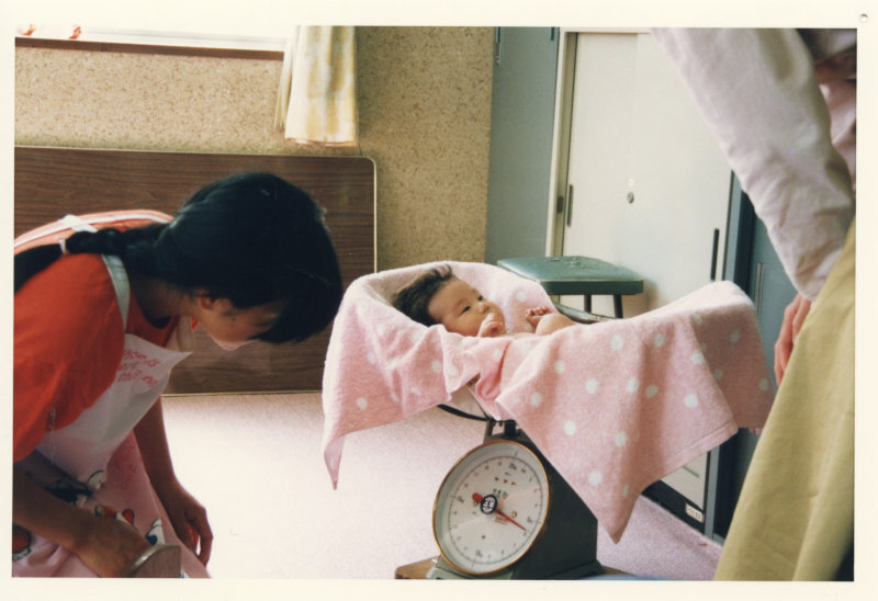 保健師の乳幼児指導の写真